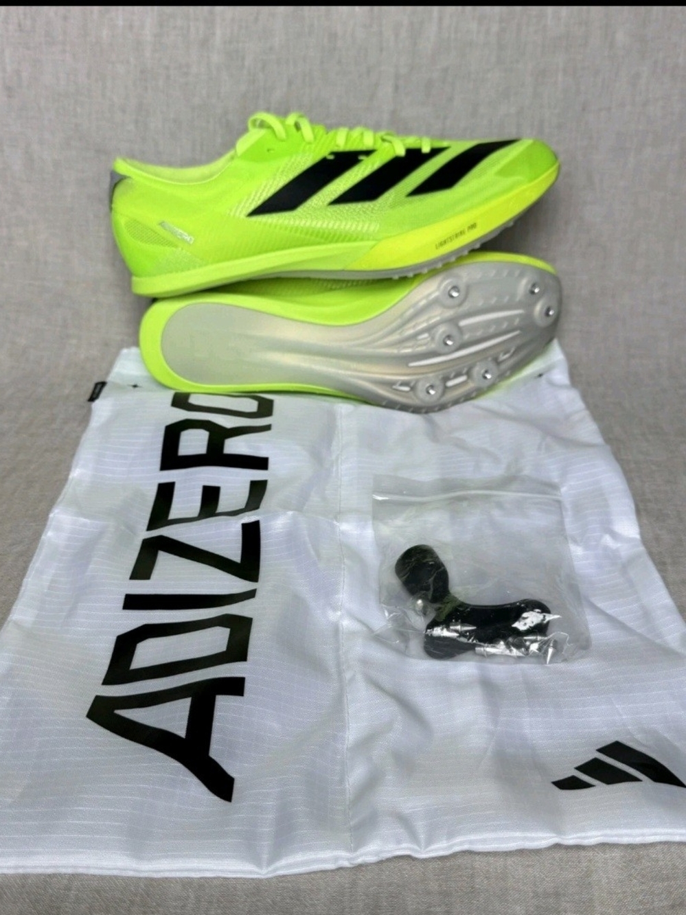Adizero Neon Yellow Track Spikes with Black Stripes